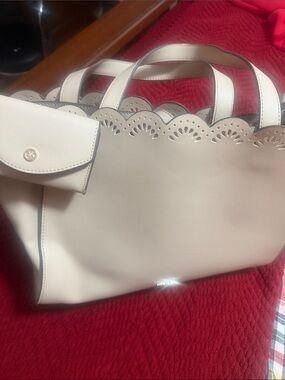 This is an Anne Klein Pale Cream Scalloped Leather Tote not Michael Kors